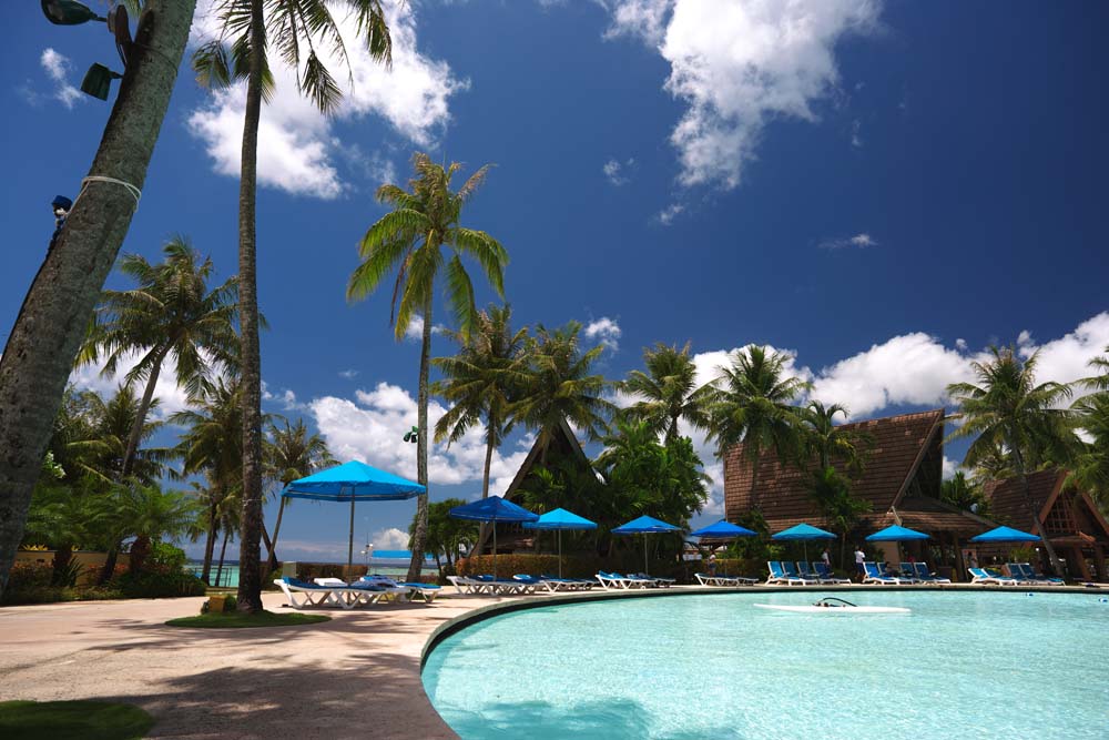 photo,material,free,landscape,picture,stock photo,Creative Commons,A resort beach side, south island, resort, swimming pool, parasol