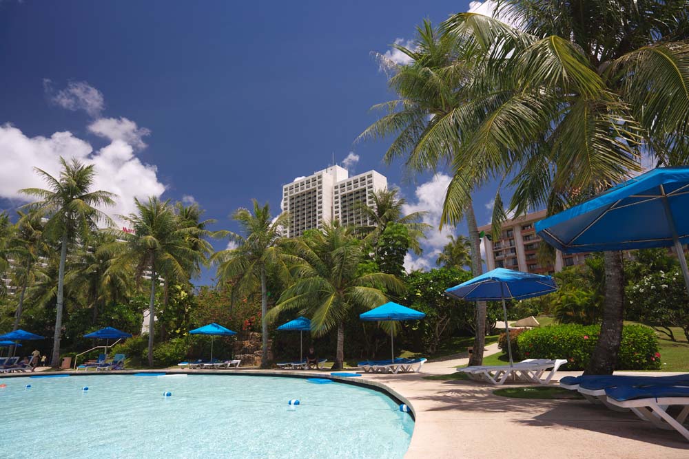 photo,material,free,landscape,picture,stock photo,Creative Commons,A resort beach side, south island, resort, swimming pool, parasol