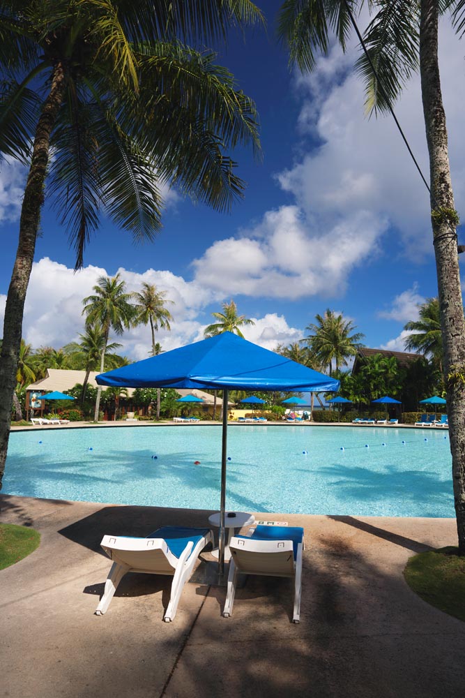 photo,material,free,landscape,picture,stock photo,Creative Commons,A resort beach side, south island, resort, swimming pool, parasol