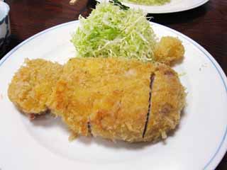 Foto, materiell, befreit, Landschaft, Bild, hat Foto auf Lager,Ein gebratener Schweinefleischschnitzel, Schweinefleisch, Gebackenes in Fett Essen, Kohlkopf, Schnitzel