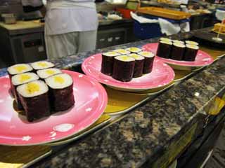 photo,material,free,landscape,picture,stock photo,Creative Commons,Belt-conveyor sushi, I wind up pickles, Vinegared rice rolled in dried laver, Japanese radish, Rolled drapery